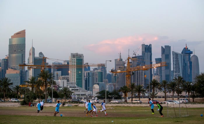 In 2016, as Doha grew behind them, Migrant workers played soccer on the smallest of stages.